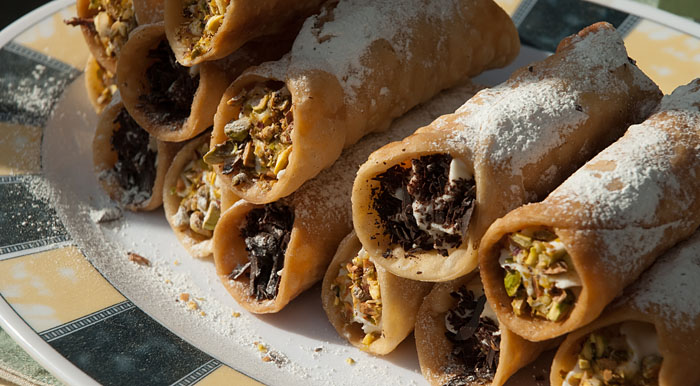 Cannoli - a Sicilian speciality, filled with sweet ricotta
